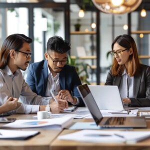 Group of attorneys collaborating on strategic internet marketing solutions in a modern office